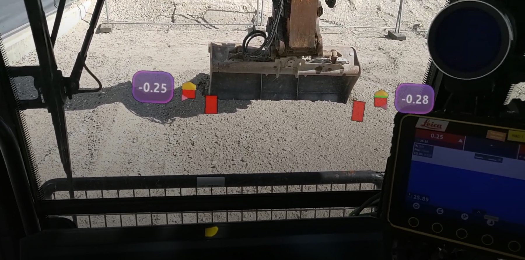 AR grade values next to the bucket at a real worksite